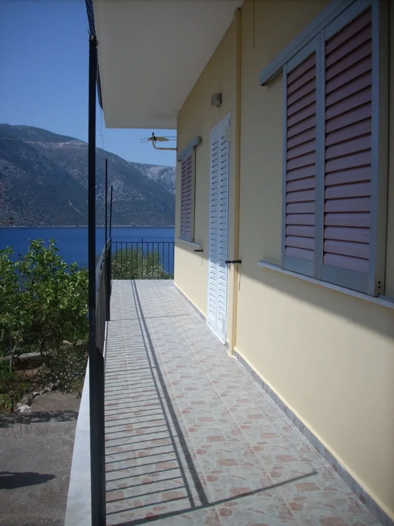 Balcony walkway with sea view at Olympia House