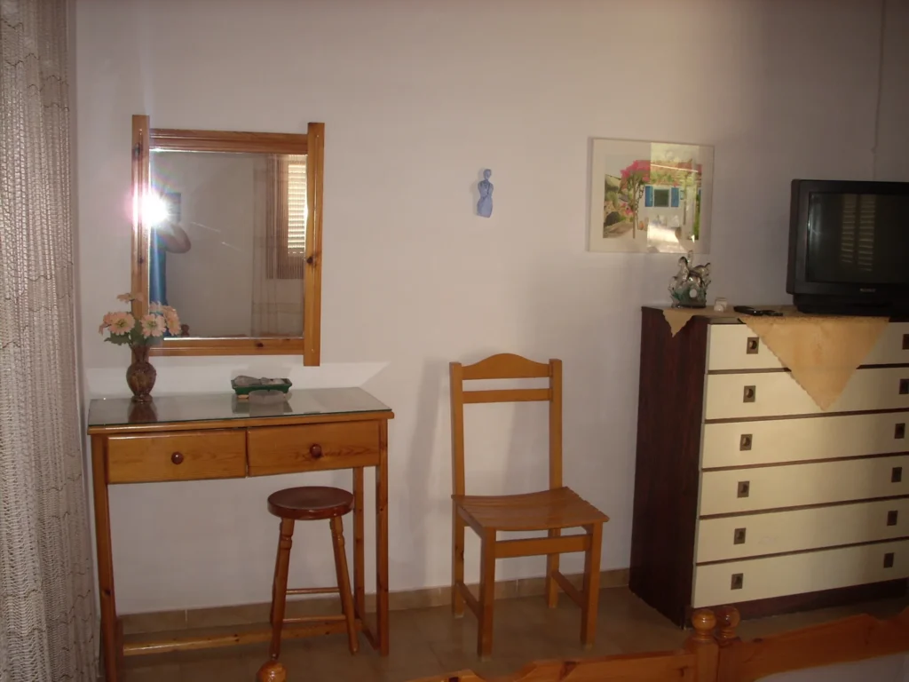 Bedroom furniture with dressing table and TV