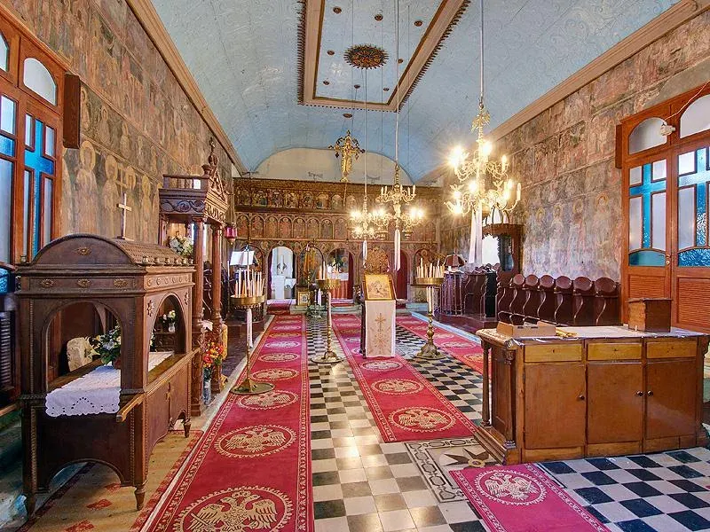 Interior of a church with a carved wooden iconostasis, Ithaca